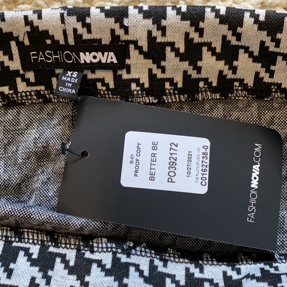 Brand new plaid mini skirt. Selling because too small - Picture 3 of 3